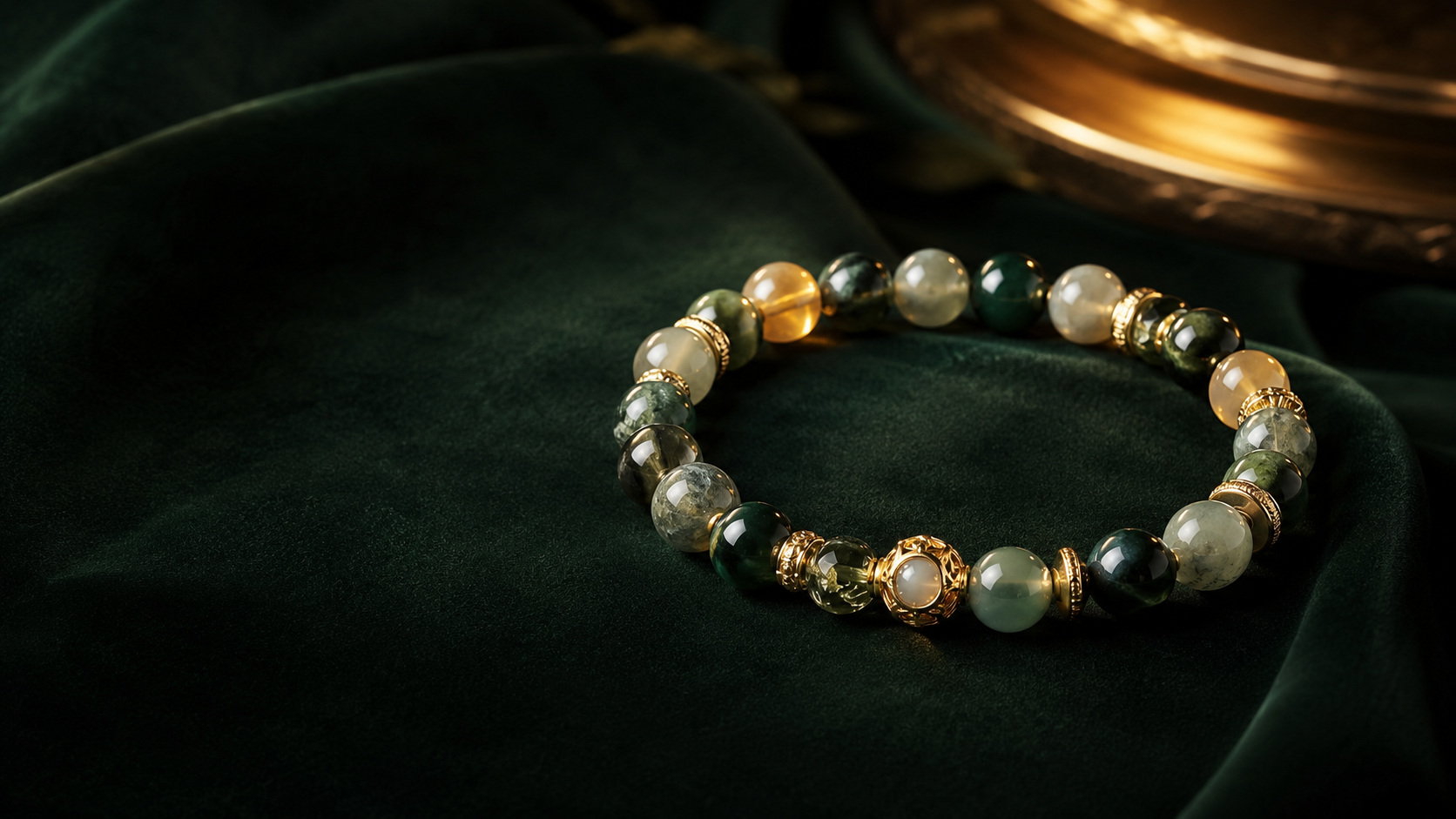 A natural gemstone bracelet on forest-green velvet